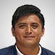 Retrato de Roberto Jiménez, hombre maduro con gafas